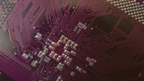 Purple microchip close-up on a dark background. Stock-Footage 90433518