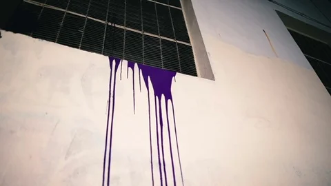 Purple paint flows down the wall Stock Footage 81699872
