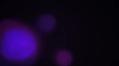 Purple particles on black background. Stock Footage 333928212