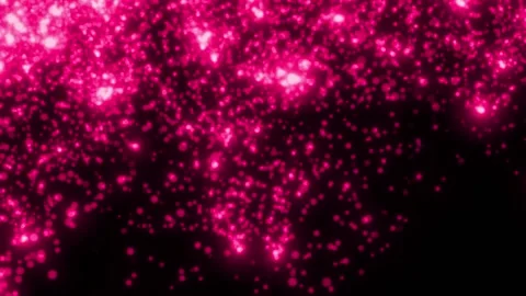 PURPLE particles glowing on the black background. Black background with light Stock Footage 218579465