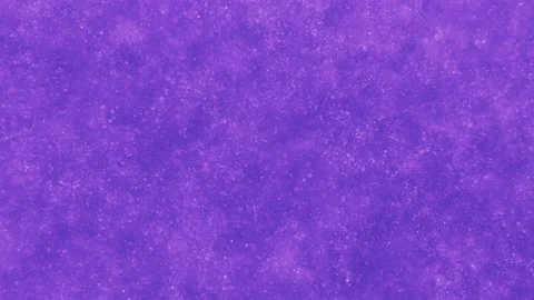 Purple particles swirling in clear fluid on dark background. Vj Stock Footage