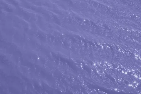 Purple pattern of water waves Stock Photos