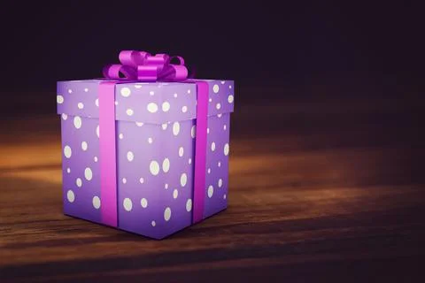 Purple polka dot gift box is sitting on wooden tabletop, showing pink ribbon and Stock Illustration
