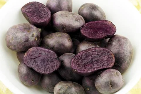 Purple potatoes Stock Photos