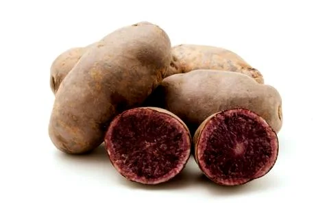 Purple potatoes Stock Photos