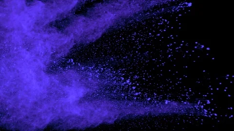 Purple powder explosion in slow motion from left of screen. Video stock 122439895