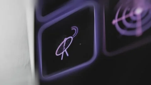 Purple satellite dish emits three signal waves from a black touchscreen button Vídeo Stock 343377388