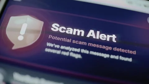 Purple scam alert with shield icon Stock Footage 345502551