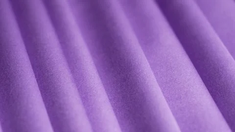 Purple silk fabric texture draped in soft folds, close-up Stock Footage 295019411