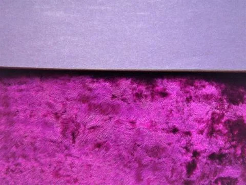 Purple solid color surface of colored paper as a background 库存照片