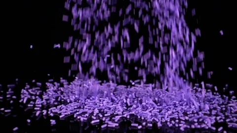 Purple Sprinkles falling in slow motion. 库存影片 88615688