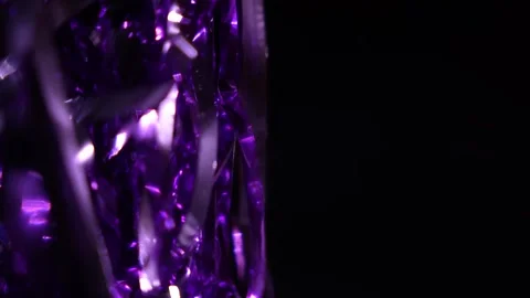 Purple string light on the left in the blackness Stock Footage 315318259