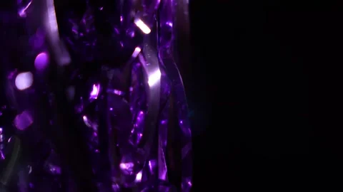 Purple string of light moving from left to right in the dark Stock Footage 315318213