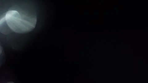 Purple stringy light and fast moving white spots from the left Stock Footage 315318155