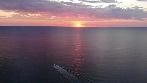 Purple sunset boat Stock-Footage 129842225
