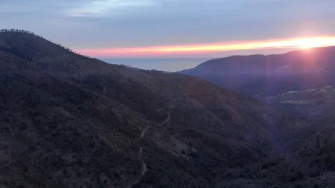 Purple sunset in the mountains Stock Footage 128543747