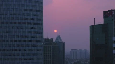 Purple sunset timelapse through office buildings 動画素材 61761635