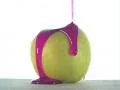Purple Syrup Pours Over an Apple Video