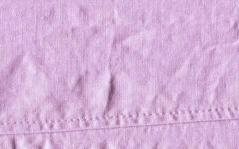 Purple textile texture background 写真素材