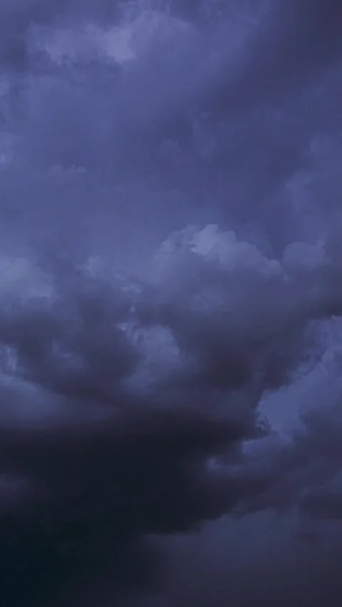 Purple violet magenta Cloudy Sky With Dark Storm Clouds During Rain. Natural Stock Footage 341341096