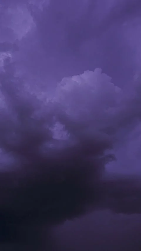Purple violet magenta Cloudy Sky With Dark Storm Clouds During Rain. Natural Stock Footage 341375272
