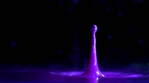 Purple water drop in slow motion Видео 44293988