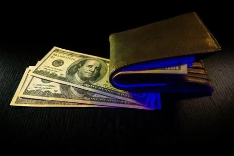 Purse with dollars Stock Photos