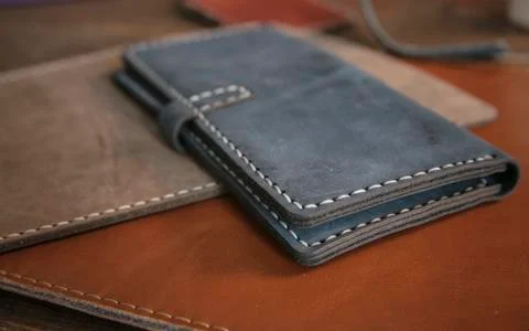 Purses in different styles which made from colorful genuine leather Stock Photos