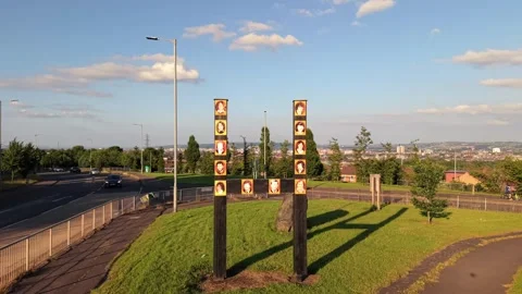 Push-in 4K 60FPS aerial video of the H-Block monument on Monagh Road in Stock Footage 340563156