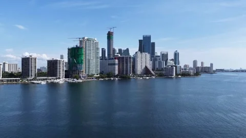 Push in Aerial of Brickell Skyline Towers Across Biscayne Bay, Miami Vídeo Stock 344598064