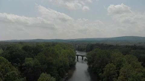 Push-In Aerial Flight Over River, Bridge, Mountains and Clouds in Northeast US Stock Footage 113877093