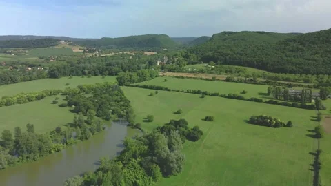Push in aerial shot of the valley of 5 Chāteaux near Beynac-et-Cazenac 4K 60fps Stock Footage 203849196