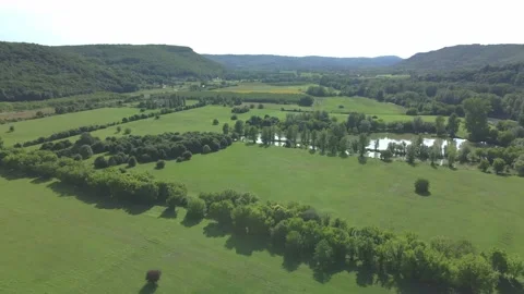 Push in aerial shot of the valley of 5 Chāteaux near Beynac-et-Cazenac 4K 60fps Stock Footage 203849301