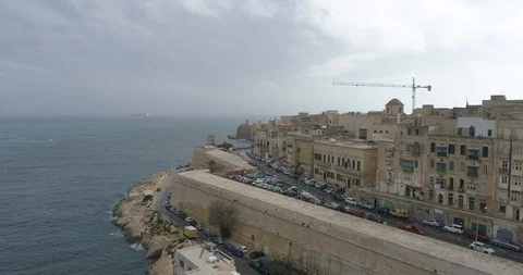 Push and reveal of the west side of Valletta Stock Footage 119552362