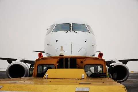 Push back of the airplane before take off Stock Photos