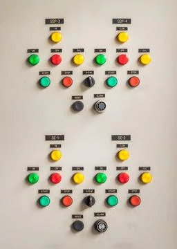 Push button and selector switch of control panel of a building. Stock Photos