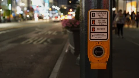 Push button to cross at a crosswalk in New York City Stock Footage 116743612