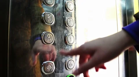 Push on the button in an elevator and lift movement Stock Footage 57231247