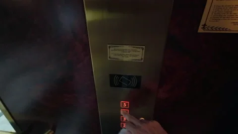 Push button in elevator with floor level 5. Luxury interior in hotel apartment. Stock Footage 235385043