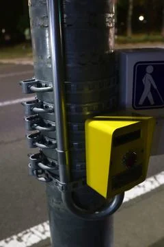 Push-button traffic light at night. Stock Photos