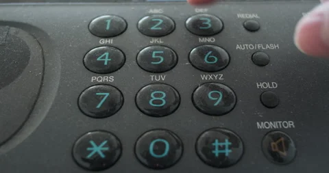 Push buttons on old vintage analog telephone keypad, male hand presses the dial Stock Footage 289552715