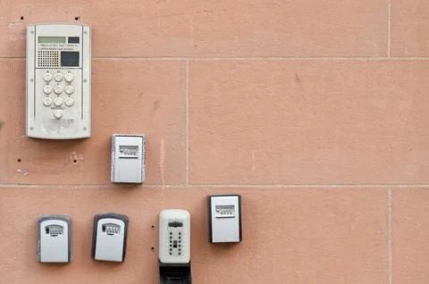 Push buzzer intercom door bells for entry to building Stock Photos