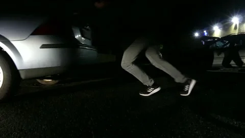 Push the car at night Stock Footage 229795168