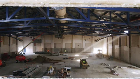 Push Into Dramatic Lighting Falling On Construction Site Workers 4K 48FPS SL Stock Footage 266318761