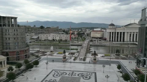 Push in Drone Shot of the Alexander Statue, River, Bridge in Skopje City Center, Stock Footage 214313012