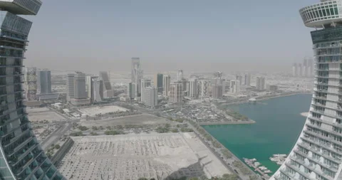 Push in drone shot through Katara towers in Lusail city in Qatar. Stock Footage 175661296