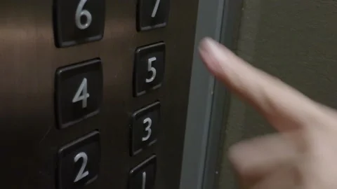 Push Elevator Button. Hand pressing lift button up to high floor Stock Footage 165123630