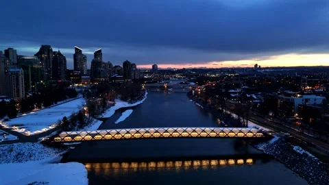Push forward Peace Bridge bow river winter evening awesome lights Stock Footage 334698714