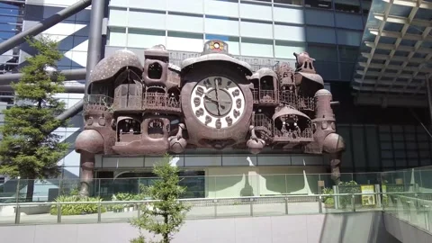 Push into Hayao Miyazaki's NTV Clock near Shiodome station. Stock Footage 165920644