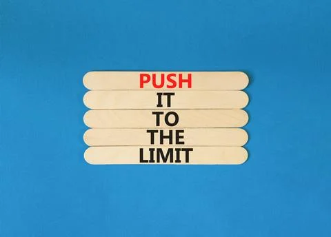 Push it to the limit symbol. Concept words Push it to the limit on wooden s.. Stock Photos